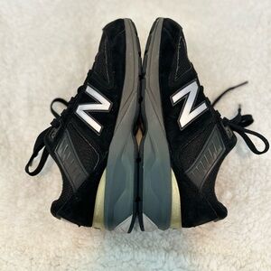 New Balance Black and Gold Athletic Sneakers
